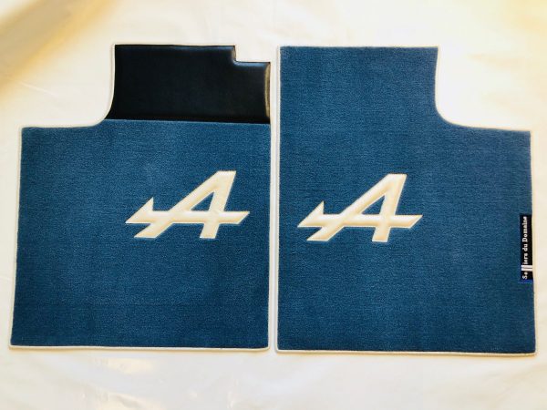 Renault Alpine A310 pair on blue carpet